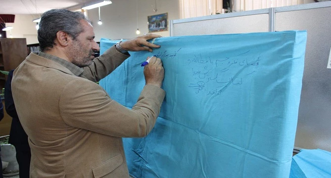 برنامه سخنی با کتاب در حضور مسئولین، اعضای هیات علمی، کارکنان و دانشجو معلمان 13