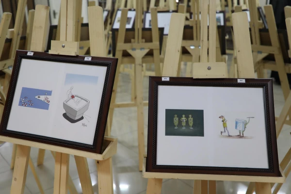 برگزاری نمایشگاه کاریکاتور با موضوع کتاب با حضور دکتر خنیفر در سازمان مرکزی دانشگاه
 21